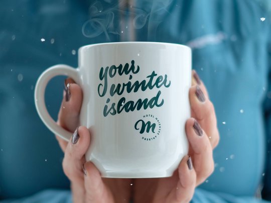 Your hotel in St. Christoph am Arlberg Person holding steaming cup with text your winter island