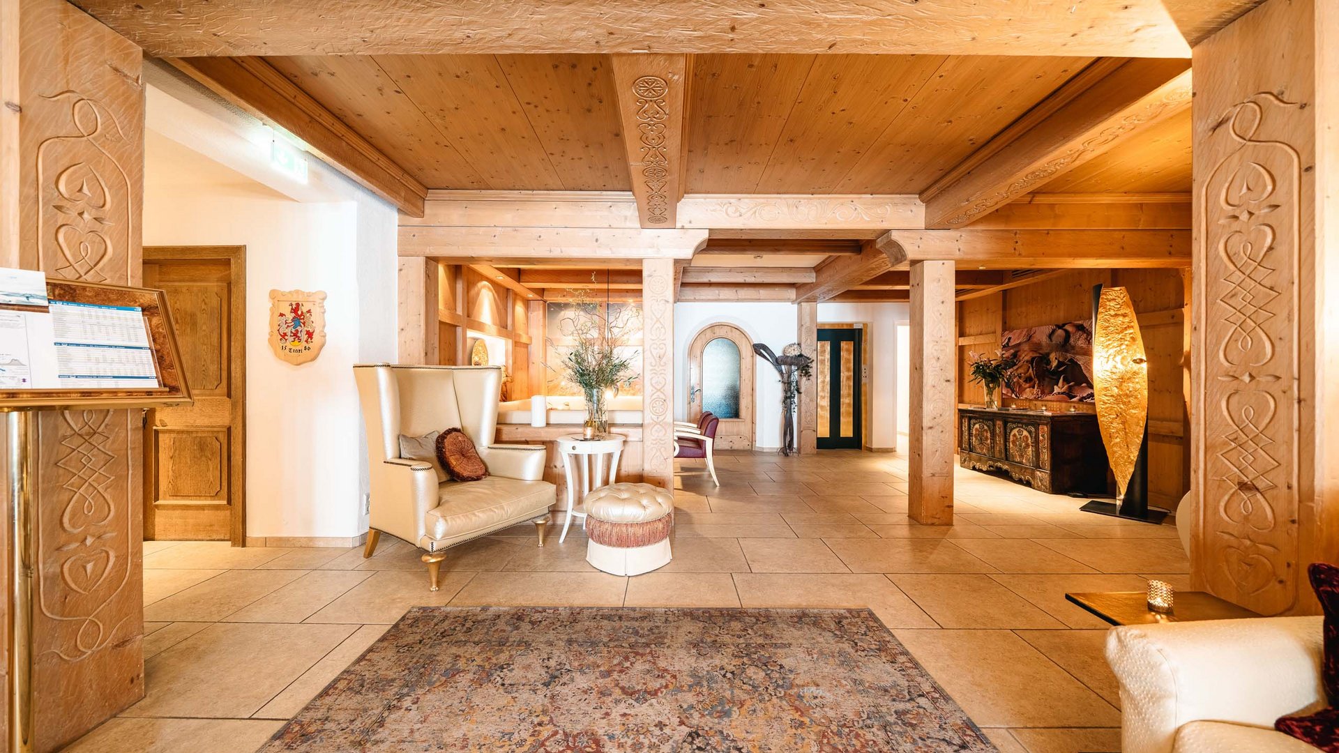 Hotel Maiensee: your hotel in St. Christoph Cozy lobby area with wooden ceiling and comfortable armchairs