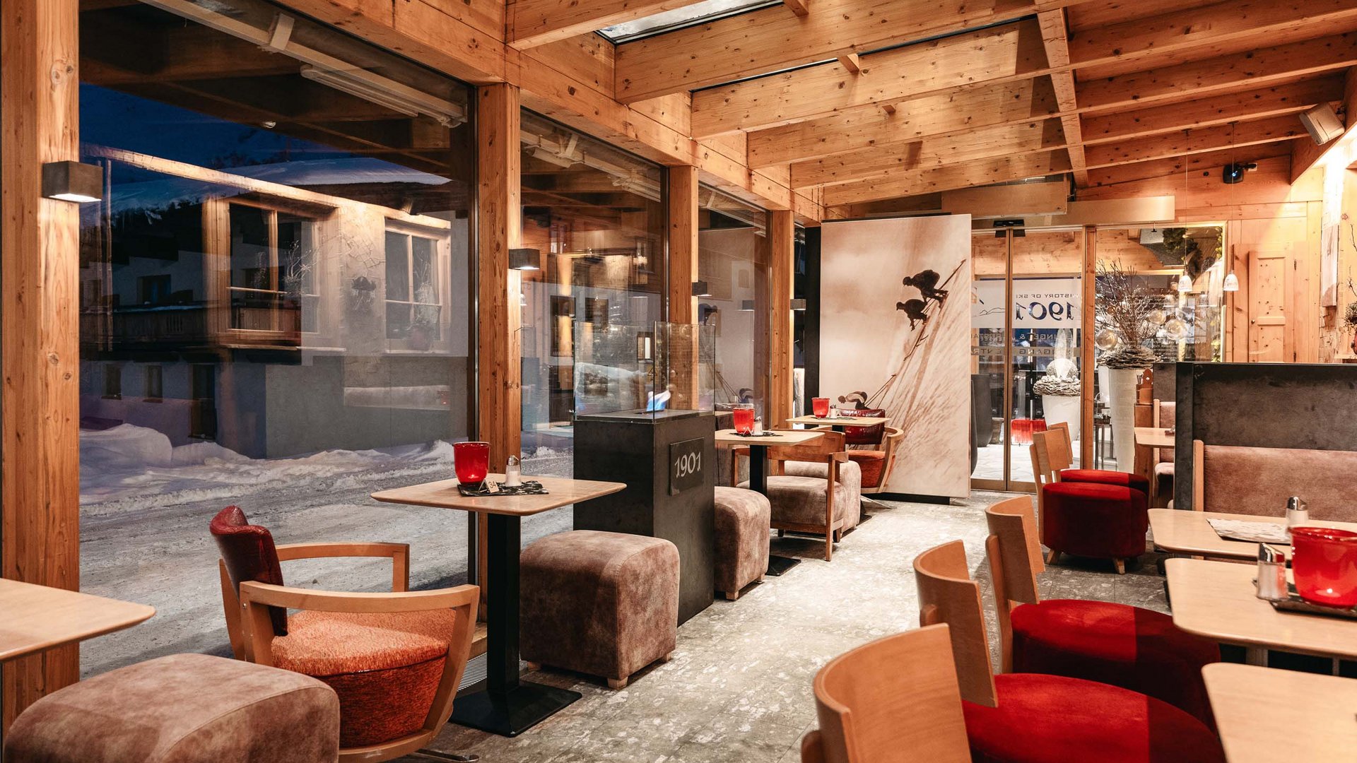 Your event in our hotel near St. Anton Cozy café with wooden ceiling and large windows overlooking snowy street